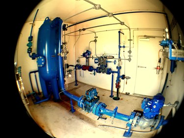 Typical well house interior piping and valves
